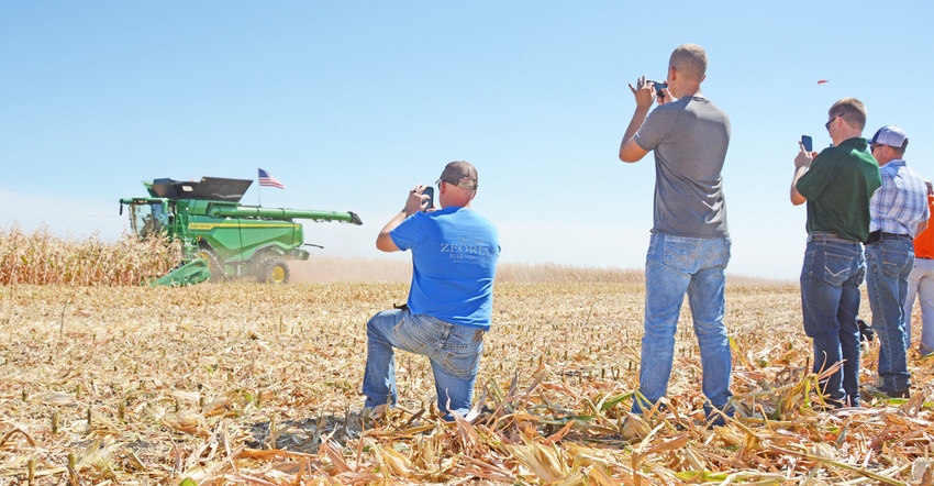 Five farmers were on hand at the Husker Harvest Days show site in Nebraska to inspect hay equipment and cattle chutes