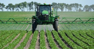 Herbicide being applied to field