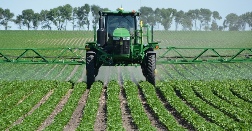 Herbicide being applied to field