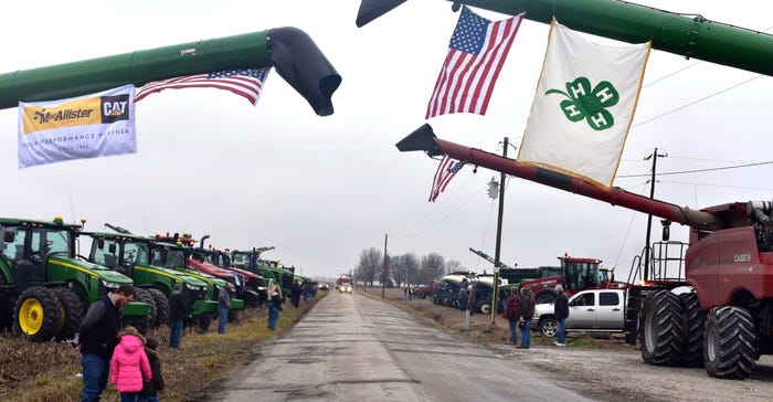 friends and farm equipment line road for Teddy York's memorial