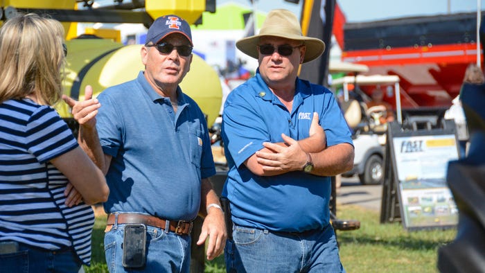 two men at Farm Progress Show two men at Farm Progress Show