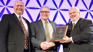 Randy Kron, Ken Foster, Hovde award recipient, and Bernie Engle at the 2023 Indiana Farm Bureau Convention