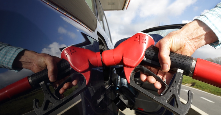 gas being pumped in car gas being pumped in car