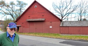 Bob Hallock admires Bronck Museum's New World Dutch Barn