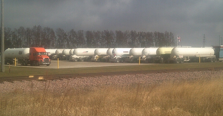 Delivery trucks waiting in line to fill up with propane at Sanborn pipeline terminal in Iowa
