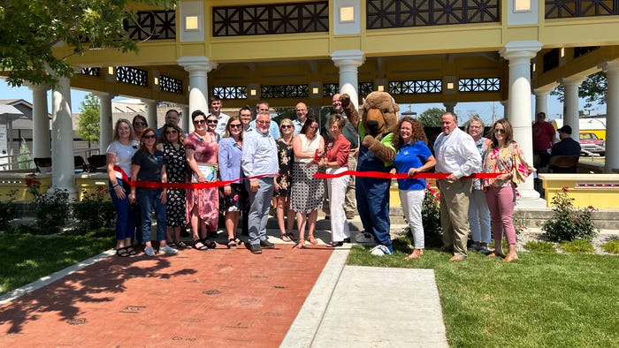 Group ribbon-cutting for House of Capper