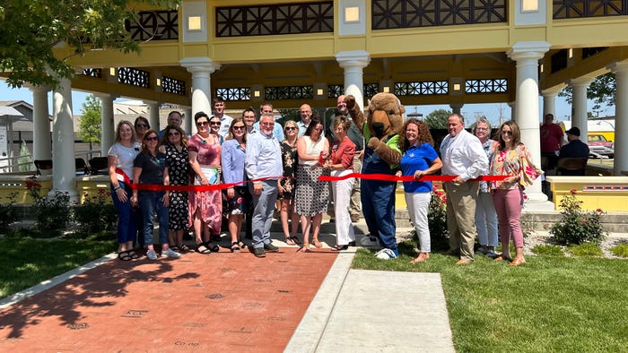 Group ribbon-cutting for House of Capper Group ribbon-cutting for House of Capper