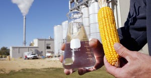 ear of corn, beaker, ethanol plant