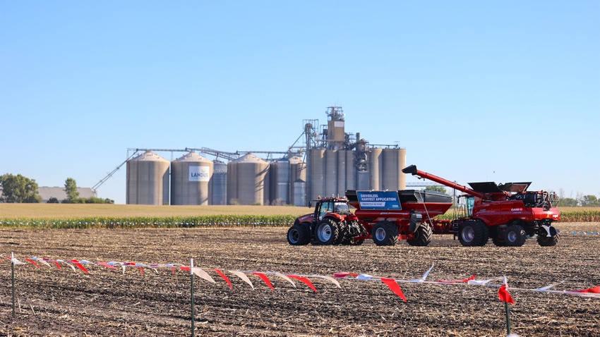 An autonomous tractor on display in the middle of a field An autonomous tractor on display in the middle of a field