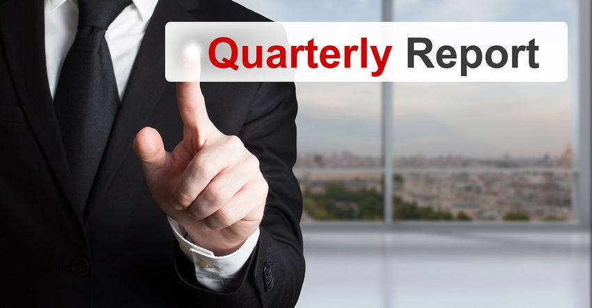 businessman pushing button on quarterly report