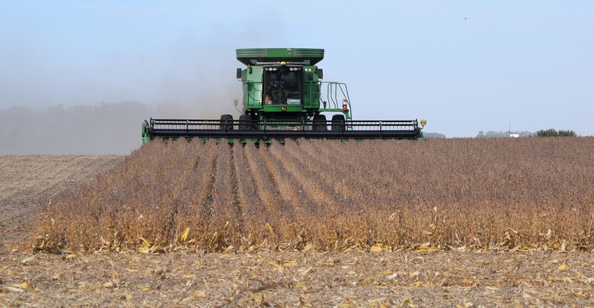 Combine in soybean field