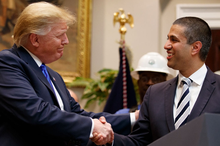President Donald Trump shakes the hand of FCC Chair Ajit Pai