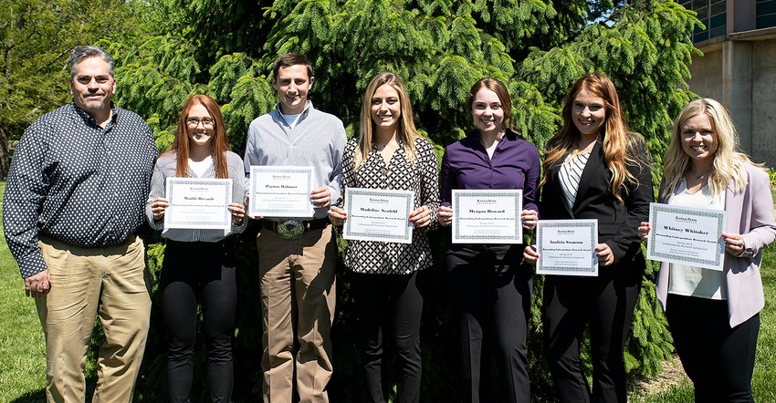 Winners of the K-State Department of Animal Sciences and Industry Undergraduate Research Symposium, left to right are: Dr. Ma