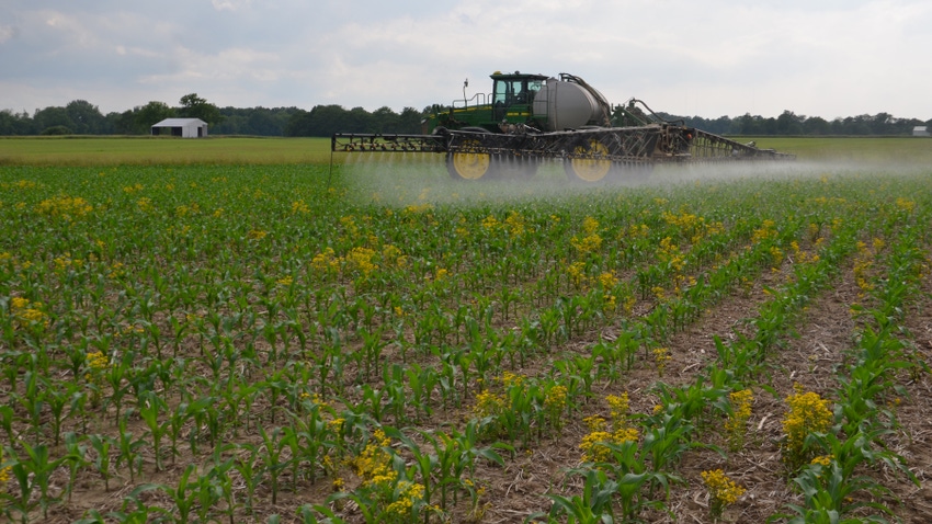  pesticides being applied to cornfield