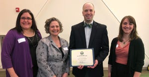 Members of the Iowa Ag Literacy Foundation team accept their award for leadership in education