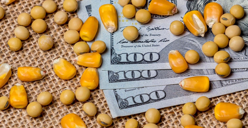 Corn and soybeans on 3 $100 bills