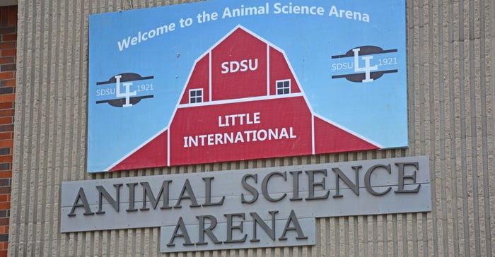 Dairy cows are lined up outside the Animal Science Arena at Little International Dairy cows are lined up outside the Animal Science Arena at Little International