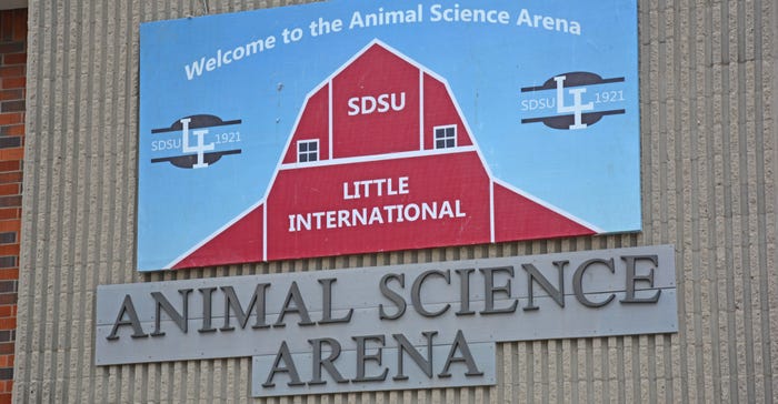 Dairy cows are lined up outside the Animal Science Arena at Little International