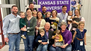 Steve and Cindi Ohlde surrounded by family at K-State