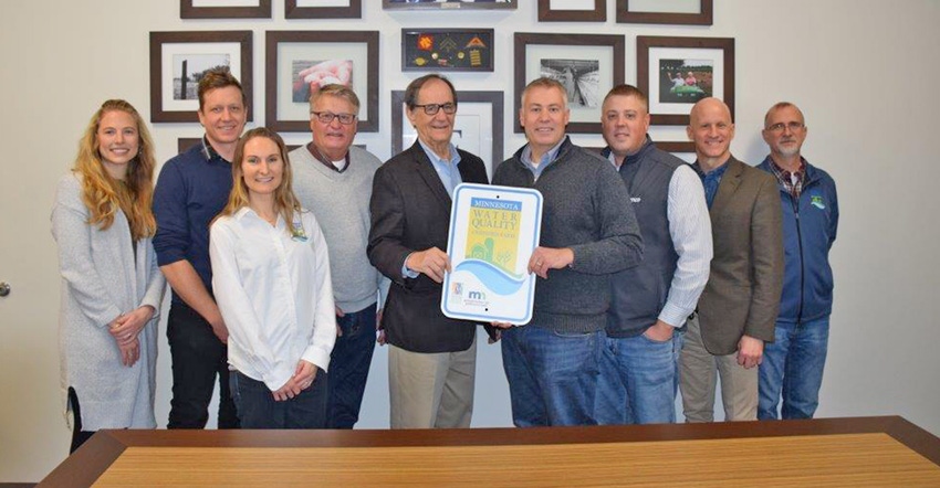 Forsman Farms staff receiving MAWQCP with state officials
