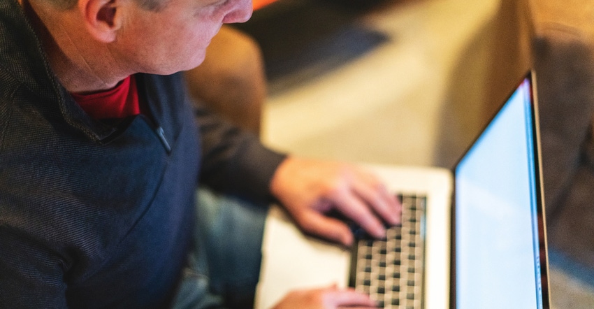 man working on laptop