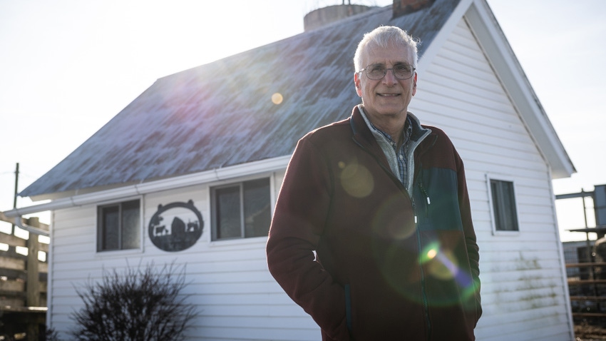 2023 Prairie Farmer Master Farmer Ron Moore standing in front of white barn 2023 Prairie Farmer Master Farmer Ron Moore standing in front of white barn
