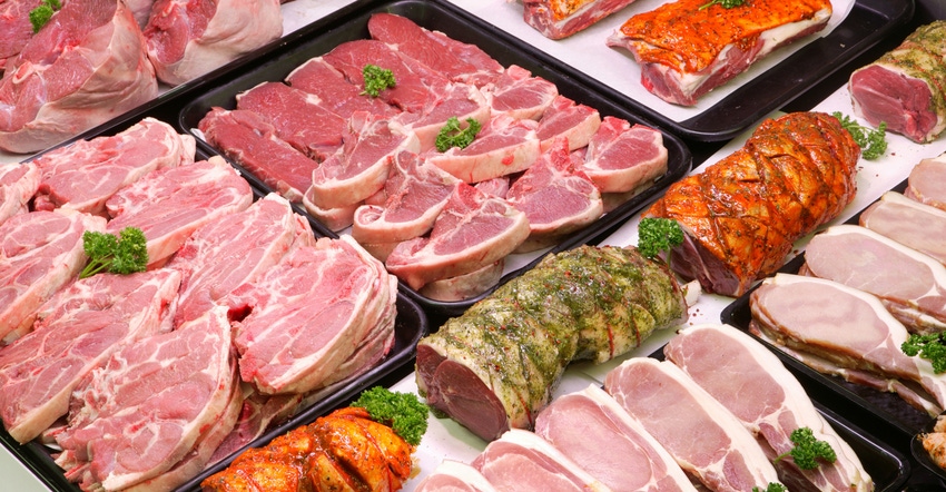 cuts of pork in meat case at store