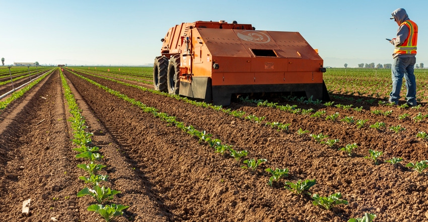 Farmwise's Titan machine in action in a field