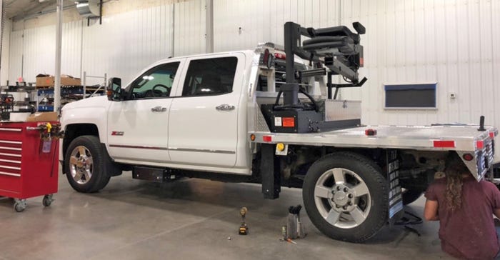 Ryan Buck had his new flatbed lift installed on his three-quarter-ton truck