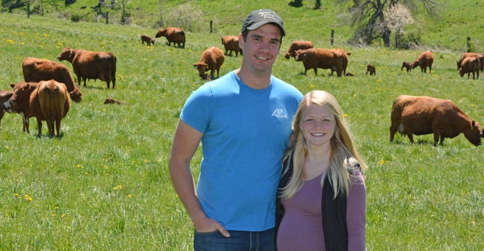 Jared and Valerie Luhman, Goodhue, Minn., with cattle grazing in background