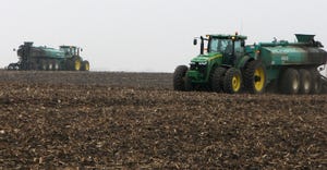 Manure being applied to soil