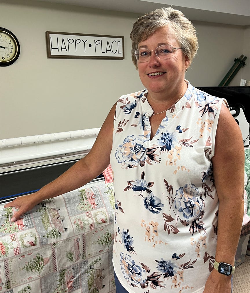 Ericka Breuer often uses this longarm machine to quilt for others.