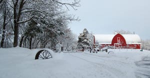red barn in white snow