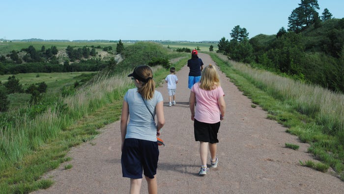 People walking on the cowboy Trail which runs from Norfolk to Valentine