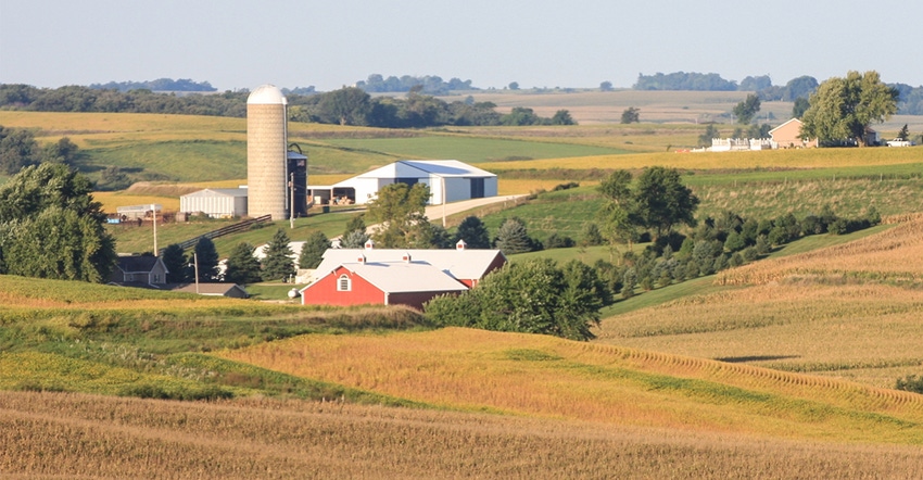 A farmstead tucked into the rolling hills of southwest Iowa creates a beautiful scene in autumn before the corn is harvested.