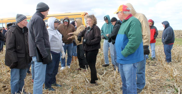 conservation outreach specialist for Iowa Learning Farms, Liz Juchems at a field day with farmers
