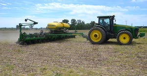 John Deere planter planting soybeans