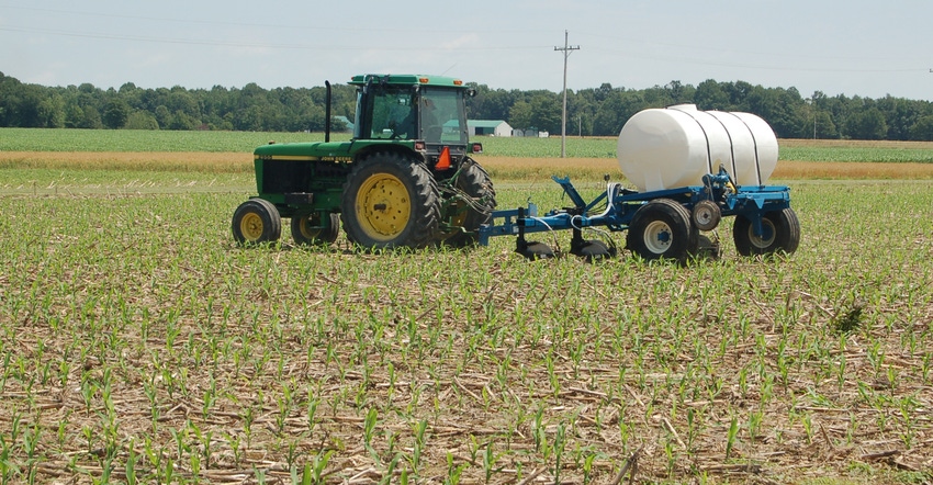 nitrogen being applied to young corn crop