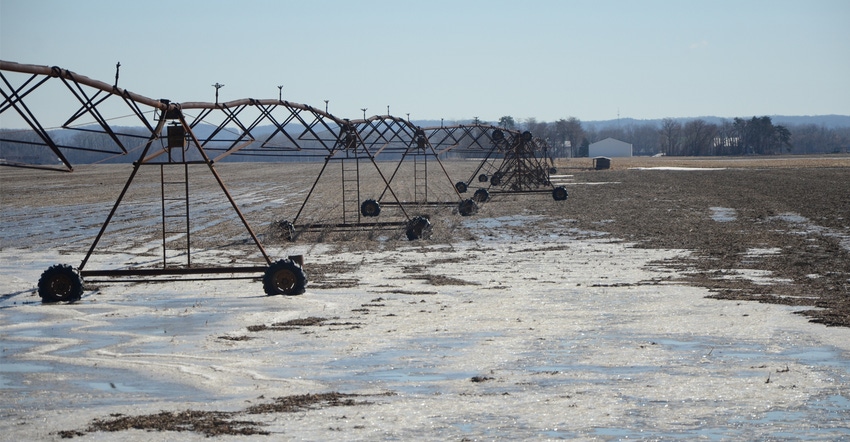 flooded field with irrigation equipment flooded field with irrigation equipment