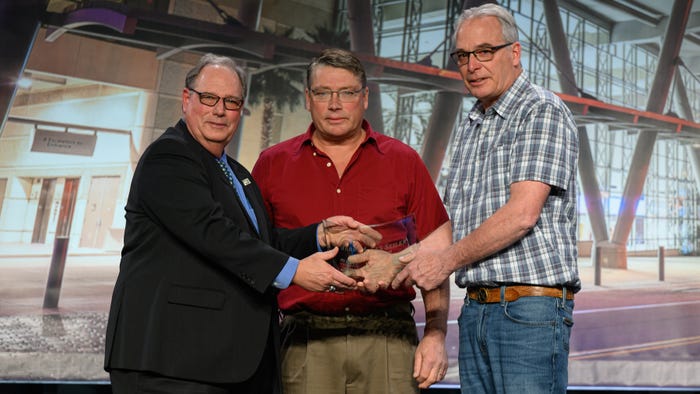  ASA President Daryl Cates presents Les Seiler and his brother, Jerry, with ASA’s National Conservation Legacy Award