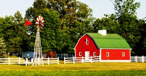 red barn with windmill