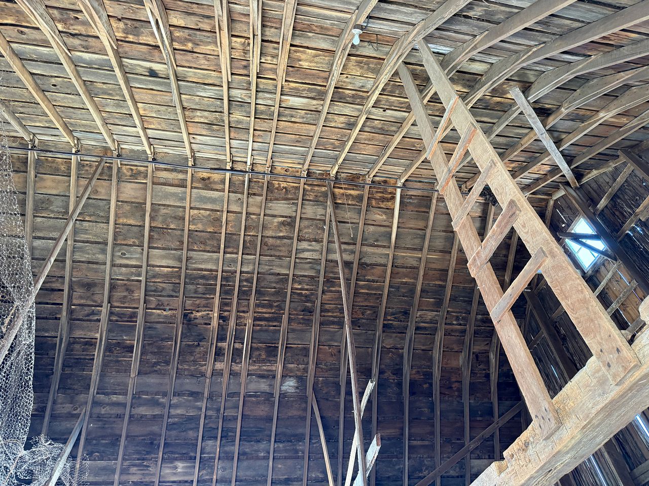 Moving day: 100-year-old barn rolls to new home