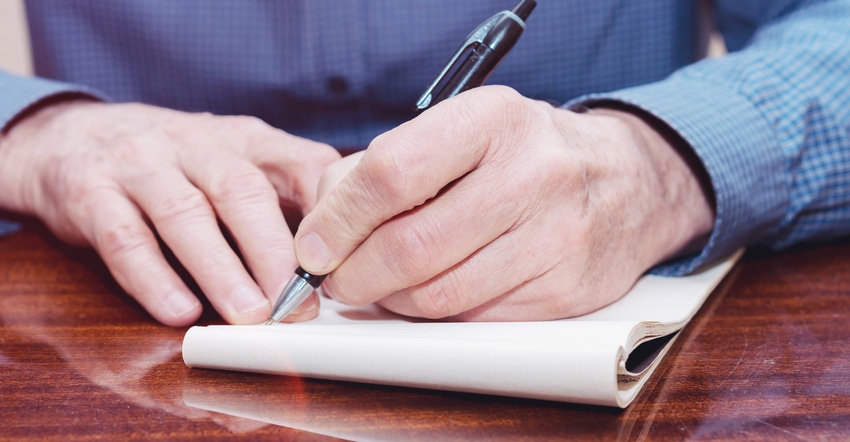 hand writing in notebook hand writing in notebook