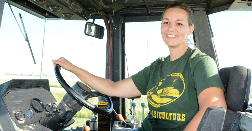 Carie Moore, in her 4WD Steiger