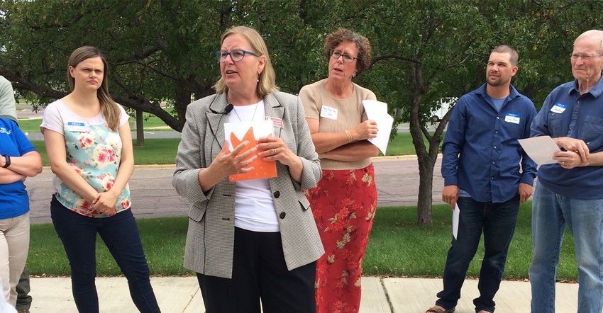 Denise Stromme (center) led participants in a group exercise 