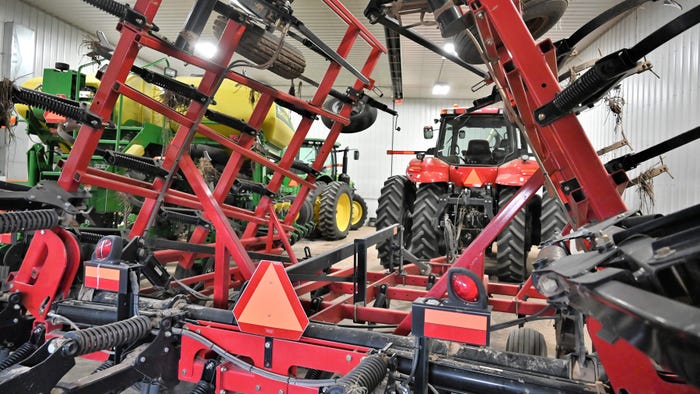 Farm equipment in farm shop Farm equipment in farm shop