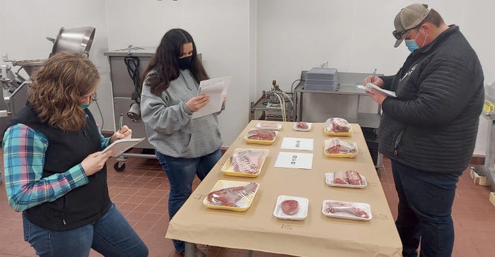 4-H members learn how to identify cuts of meat 
