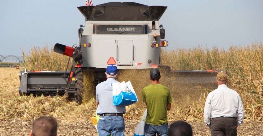 Visitors at HHD watching combine demos Visitors at HHD watching combine demos