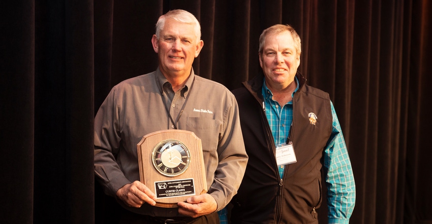 Curtis Claeys (left), ICA 2018 Outstanding Commercial Producer Award winner, shown with Larry Johnson, 