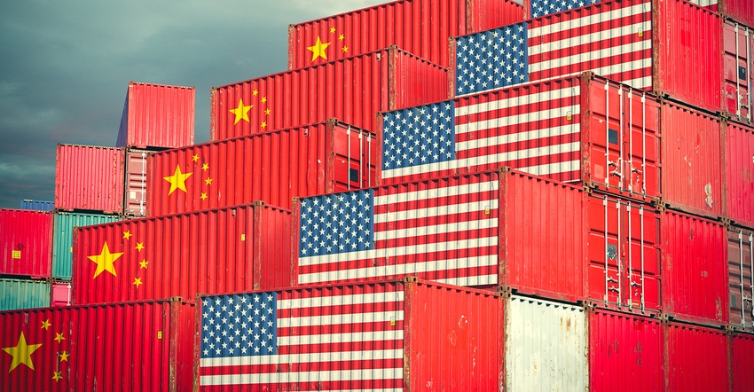 cargo containers marked with U.S. and China flags